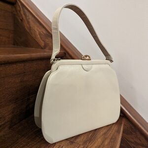 Vintage mid century ivory leather handbag.
